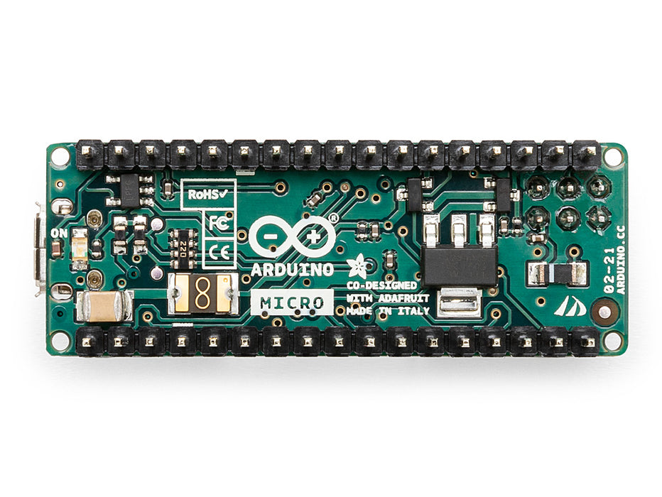 Rear view of Arduino Micro board with headers, showing PCB layout and solder points.