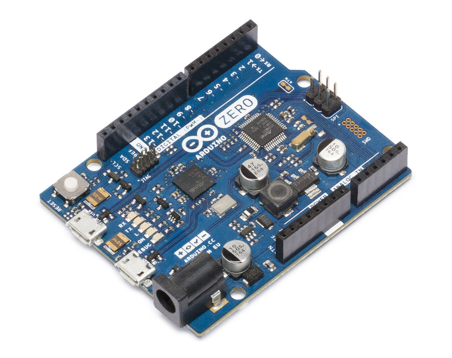 Angled perspective of Arduino Zero board highlighting micro USB connectors, DC power jack, and onboard components on a compact blue PCB.